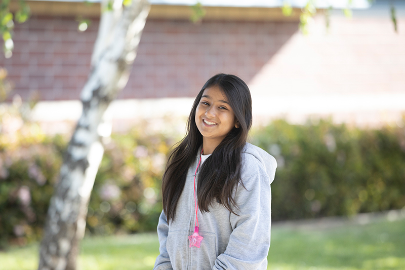 Girl by Tree
